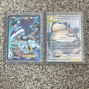 Pokemon Kyogre EX and Eevee & Snorlax GX Cards
